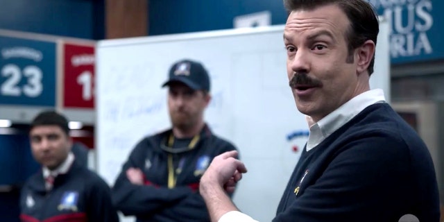 In this screen grab released April 4, 2021, Jason Sudeikis performs as Ted Lasso.