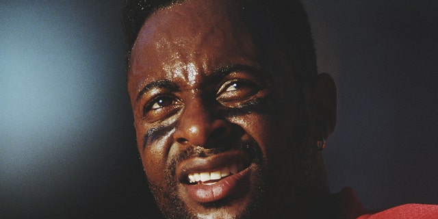 Jerry Rice of the San Francisco 49ers watches during the Cardinals game on Nov. 1, 1992, at the Sun Devil Stadium, Tempe, Arizona.