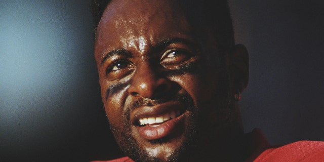 Jerry Rice of the San Francisco 49ers watches during the Cardinals game on Nov. 1, 1992, at the Sun Devil Stadium, Tempe, Arizona.