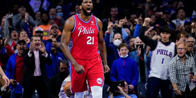 Joel Embiid of the Sixers after making a basket against the Toronto Raptors, Monday, April 18, 2022, in Philadelphia.