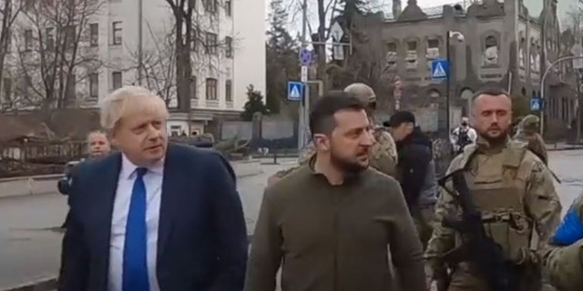 U.K. Prime Minister Boris Johnson and Ukrainian President Volodymyr Zelenskyy walk down the streets of Kyiv.