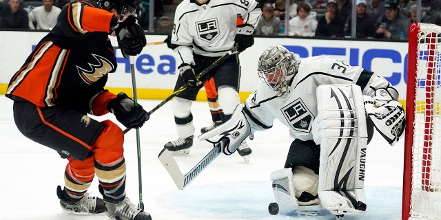 Los Angeles Kings goaltender Jonathan Quick stops a shot during the second period of a game against the Anaheim Ducks April 19, 2022, in Anaheim, Calif.