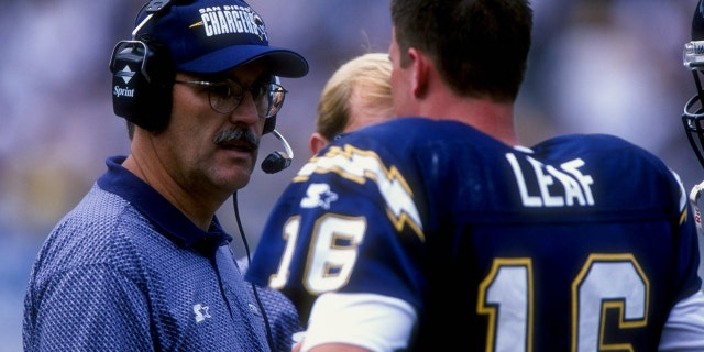 Chargers quarterback Ryan Leaf talks to head coach June Jones during a game against the Seattle Seahawks at Qualcomm Stadium in San Diego, California.