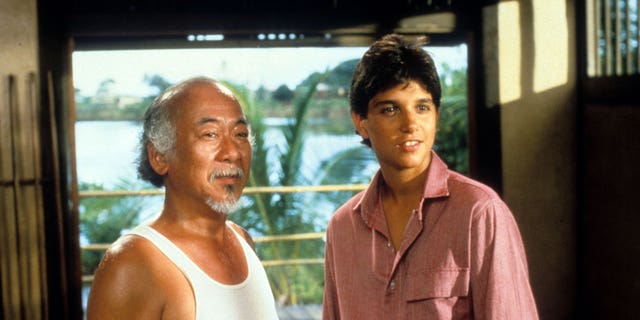 Pat Morita and Ralph Macchio in "The Karate Kid."