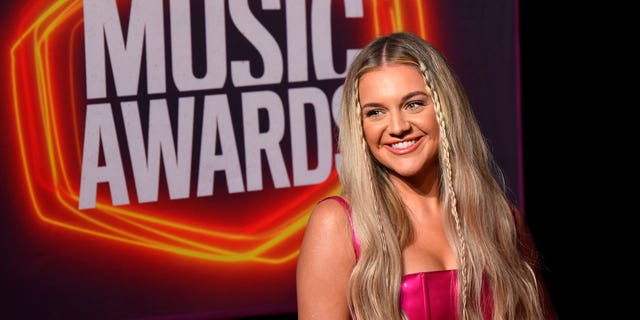 Kelsea Ballerini will host the CMT Music Awards from home after contracting COVID-19.