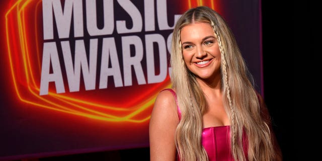 Kelsea Ballerini will host the CMT Music Awards from home after contracting COVID-19.