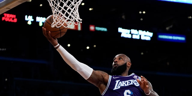 Los Angeles Lakers forward LeBron James shoots during the second half of a game against the New Orleans Pelicans in Los Angeles April 1, 2022.