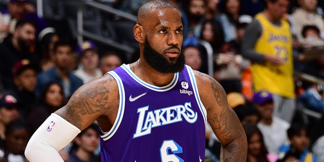 LeBron James of the Los Angeles Lakers looks on during the game against the New Orleans Pelicans on April 1, 2022, at Crypto.Com Arena in Los Angeles.