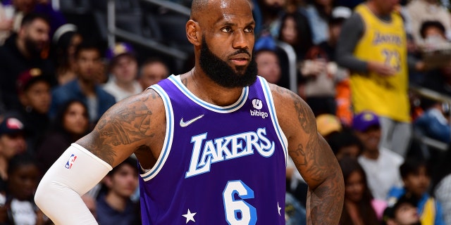 LeBron James of the Los Angeles Lakers looks on during the game against the New Orleans Pelicans on April 1, 2022 at Crypto.Com Arena in Los Angeles, California.