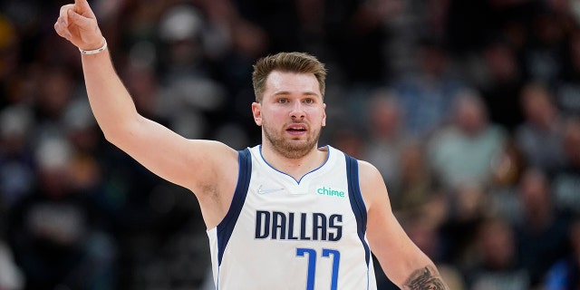 Dallas Mavericks guard Luka Doncic (77) gestures in the second half of Game 6 of an NBA basketball first-round playoff series against the Utah Jazz, Thursday, April 28, 2022, in Salt Lake City.