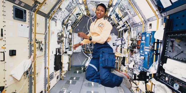 American engineer and astronaut Mae Jemison works in zero gravity in the centre aisle of the Spacelab Japan (SLJ) science module aboard OV-105, the Space Shuttle Endeavour, during NASA's STS-47 mission, 20th September 1992. Jemison is a Mission Specialist (MS) on the flight, and is the first Black woman to travel into space.