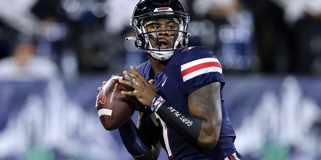 Malik Willis of the Liberty Flames throws the the ball during the LendingTree Bowl at Hancock Whitney Stadium on Dec. 18, 2021 in Mobile, Alabama.