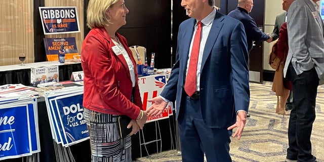 Ohio Republican Senate candidate Matt Dolan speaks with a voter at the Delaware County Republican Party Lincoln Reagan Dinner in Columbus, Ohio, on April 29, 2022. (Tyler Olson/Fox News)
