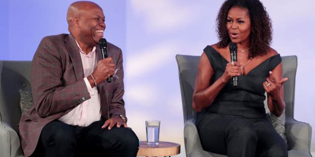Michelle Obama's nephews kicked out of school after parents file racism complaint: lawsuit 3 Former first lady Michelle Obama and her brother Craig Robinson speak to guests at the Obama Foundation summit (Photo by Scott Olson/Getty Images)