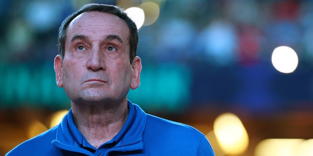 Duke Blue Devils head coach Mike Krzyzewski looks at the crowd before taking on the North Carolina Tar Heels in the semifinals of the 2022 NCAA Basketball Tournament Final Four at Caesars Superdome on April 2, 2022 in New Orleans, Louisiana.