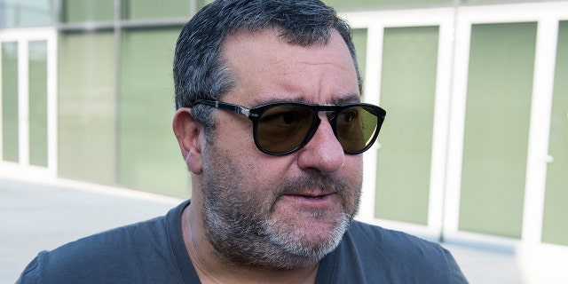 FILE - Agent Mino Raiola accompanies Matthijs De Ligt as he arrives in Turin ahead of his signing with Juventus FC on July 17, 2019, in Turin, Italy.