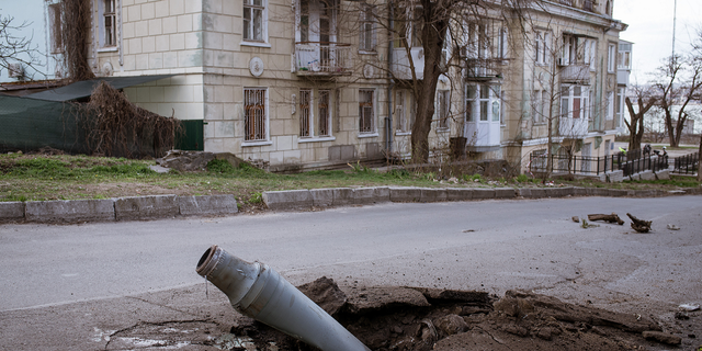 A fallen rocket, launched from Kherson but intercepted by Ukrainian forces, goes unexploded on the street in Mykolaiv, Ukraine, on April 4.