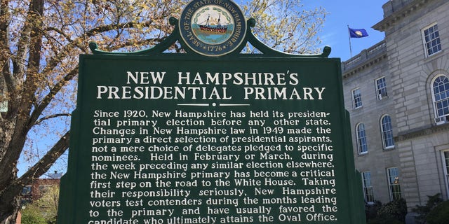 New Hampshire has held the first-in-the-nation presidential primary for a century.  A sign outside the state capitol in Concord, New Hampshire marks the state's treasured primary status.