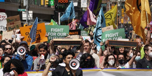 Far-left climate activist admits group's radical protests are alienating the public in tense interview People carry signs at the March for Science in collaboration with Extinction Rebellion NYC and other organizations on April 23, 2022 in New York, one day after Earth Day.