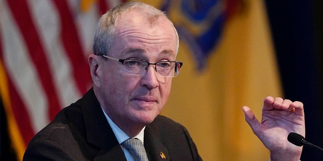 New Jersey Governor Phil Murphy speaks to reporters during a briefing in Trenton, New Jersey, Monday, Feb. 7, 2022.