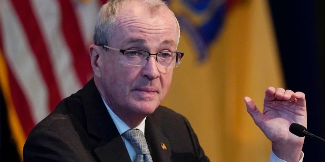 FILE -New Jersey Governor Phil Murphy speaks to reporters during a briefing in Trenton, N.J., Monday, Feb. 7, 2022. (AP Photo/Seth Wenig, File)