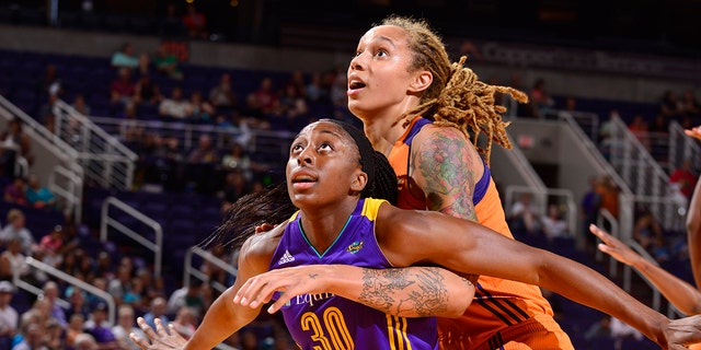 Nneka Ogwumike of the Los Angeles Sparks plays defense against Brittney Griner of the Mercury on Aug. 24, 2017, in Phoenix, Arizona.