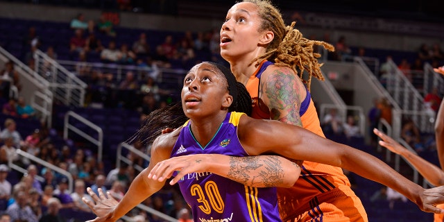 Nneka Ogwumike of the Los Angeles Sparks plays defense against Brittney Griner of the Mercury on Aug. 24, 2017, in Phoenix, Arizona.