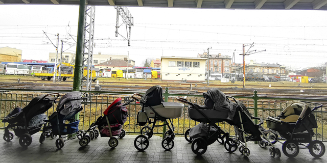 Strollers for refugees and their babies fleeing the conflict from neighboring Ukraine are left at a train station in Przemysl, Poland, on March 2.