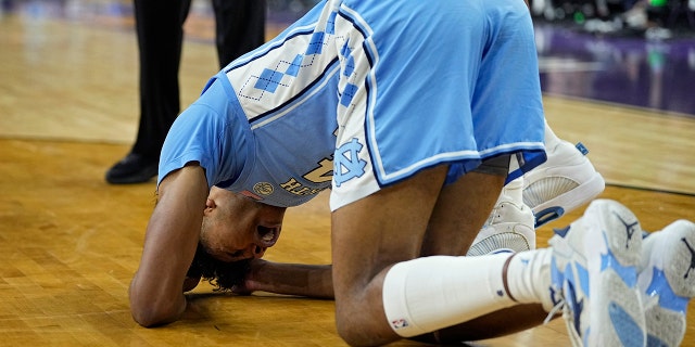 North Carolina guard Puff Johnson reacts during the second half of a college basketball game against Kansas in the finals of the Men's Final Four NCAA tournament, Monday, April 4, 2022, in New Orleans.