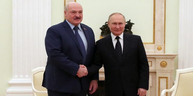 Russian President Vladimir Putin, on the right, met with his Belarusian counterpart Alexander Lukashenko on March 11 at the Kremlin in Moscow. 