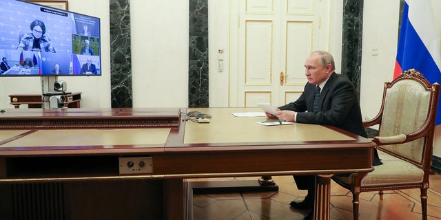 Russian President Vladimir Putin chairs a meeting on economic issues via a video link in Moscow, Russia, on Monday, April 25.