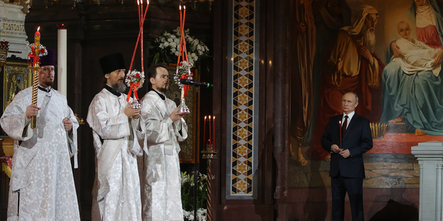 Russian President Vladimir Putin attends Orthodox Easter mass led by Russian Orthodox Patriarch Kirill at the Christ The Saviour Cathedral on Sunday, April 24 in Moscow, Russia.