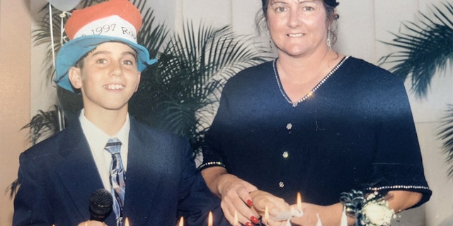 Taylor of Florida with his mom during his younger days.