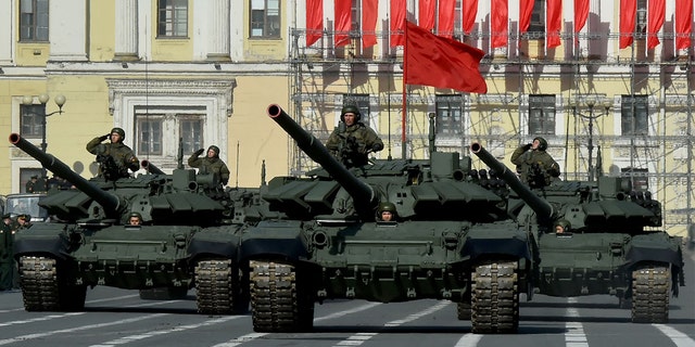 Russian military vehicles move on Dvortsovaya Square during a rehearsal for the Victory Day military parade in Saint Petersburg April 28, 2022. Russia will celebrate the 77th anniversary of the 1945 victory over Nazi Germany May 9.