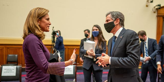 U.S. Rep Maria Elvira Salazar (R-FL) speaks with Secretary of State Antony Blinken following his testimony before the House Committee on Foreign Affairs on The Biden Administration's Priorities for U.S. Foreign Policy on Capitol Hill in Washington, U.S., March 10, 2021. Ken Cedeno/Pool via REUTERS