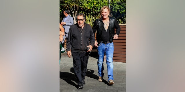 Before his injury, Mickey Rourke was all smiles having lunch with Al Pacino in Beverly Hills.