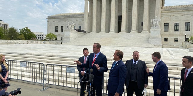Missouri Attorney General Eric Schmitt, a Republican, speaks to reporters after oral arguments in Biden v. Texas, a case on whether the Biden administration followed proper administrative procedures in rolling back the Migrant Protection Protocol (MPP). 