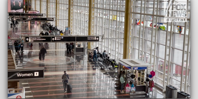 Travelers walk between terminals at Washington National Airport on April 18, 2022. (Fox News Digital/Jon Michael Raasch)