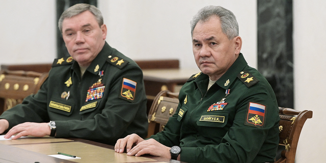 Russian Defense Minister Sergei Shoigu and Chief of the General Staff of Russian Armed Forces Valery Gerasimov attend a meeting with Russian President Vladimir Putin in Moscow, Russia.