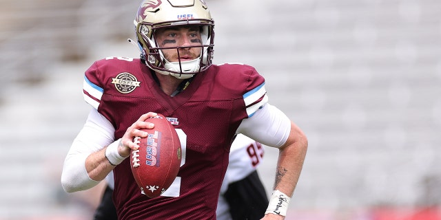 Shea Patterson of the Michigan Panthers runs with the ball against the Houston Gamblers at Protective Stadium on April 17, 2022, in Birmingham, Alabama.