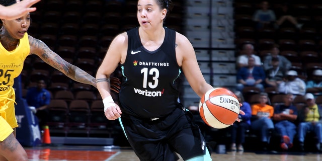 Shoni Schimmel #13 of the New York Liberty handles the ball against the Los Angeles Sparks during a pre-season game on May 8, 2018 at Mohegan Sun Arena in Uncasville, Connecticut.