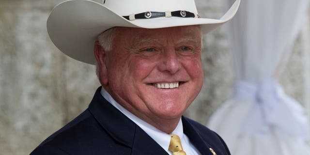 Texas Agricultural Commissioner Sid Miller exits after meetings with US President-elect Donald Trump's staff December 30, 2016