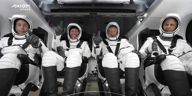 This photo provided by SpaceX shows the SpaceX crew seated in the Dragon spacecraft on Friday, April 8, 2022 in Cape Canaveral, Fla. 