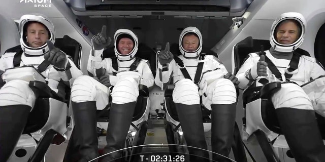 This photo provided by SpaceX shows the SpaceX crew seated in the Dragon spacecraft on Friday, April 8, 2022 in Cape Canaveral, Fla.