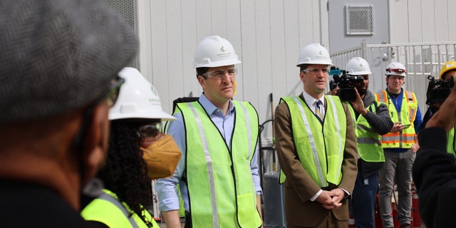 Reps. Gwen Moore, Bryan Steil and Jim Himes in the field in Milwaukee.