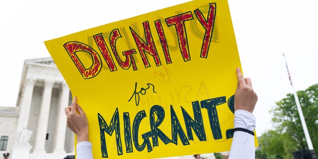 Immigration activists demonstrate in front of the U.S. Supreme Court in Washington on Tuesday, April 26, 2022, as the Supreme Court hears oral arguments in the Biden v. Texas case. (Bill Clark/CQ-Roll Call, Inc via Getty Images)