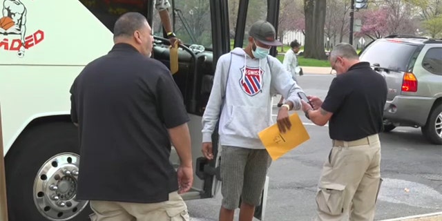 A group of migrants were bused from Texas to Washington, D.C., where they were dropped off blocks from the U.S. Capitol, Wednesday, April 13, 2022.