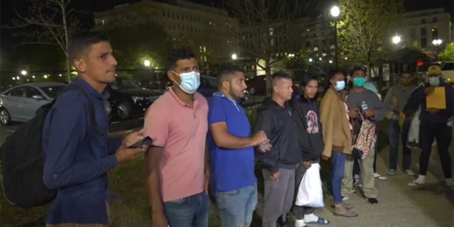 A group of migrants apprehended crossing the border into Texas arrived by bus in Washington, DC, Thursday, April 14, 2022.