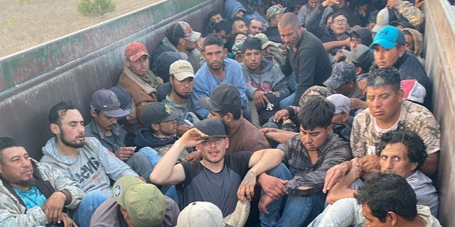 Texas Department of Public Safety officers found 76 migrants being smuggled inside a trailer in Dimmit County, Texas, Thursday, March 31, 2022. The suspected driver is a Honduran national who was in the U.S. illegally and was arrested for human smuggling, the Texas DPS said.