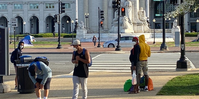 A third bus of migrants who crossed the U.S. border into Texas arrived in Washington, D.C., near the U.S. Capitol, Friday, April 15, 2022.